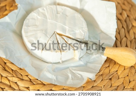Camembert cheese on the table. Selective focus. Food.