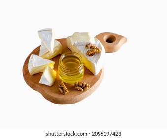 Camembert cheese with white mold nuts and honey. Isolated image - Powered by Shutterstock