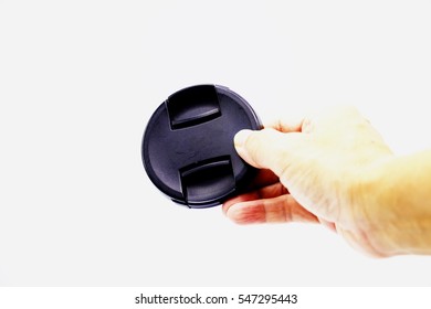 Camera cap is on white background.