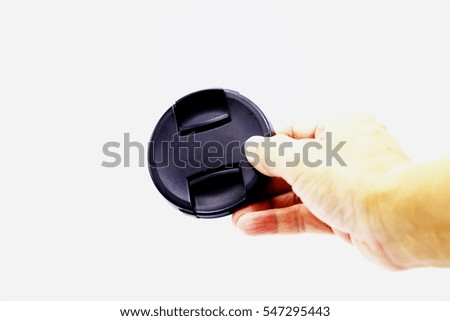 Camera cap is on white background.