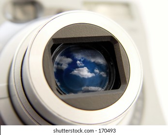 Camera with clouds in the lens