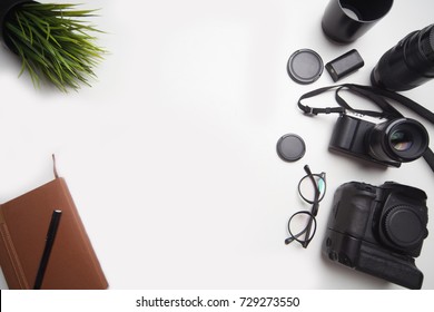 Camera Equipment On Top Of Table With Empty Space At The Middle