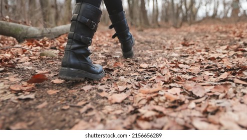 Camera Following Woman Legs While Walking In Forest Slow Motion Footage