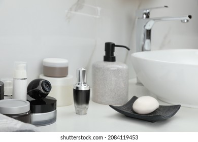 Camera Hidden Among Different Toiletries On Table In Bathroom