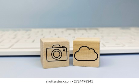Camera Icon and Cloud Computing Symbol on Wooden Blocks, Digital Storage, Online Media Backup and Data Technology Concept. 