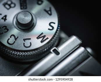 camera knob ring mode P M S A Av Tv lens focal length exposure compensation in macro and close up shot photo