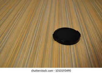 Camera lens cap