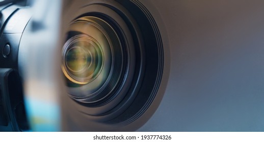  Camera lens close up and blue background 