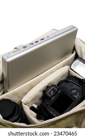 The Camera, Lens, Flash And Laptop In A Bag