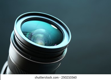 Camera lens on dark background