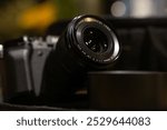 A camera lens is shown in a close up