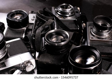 a lot of camera and lenses