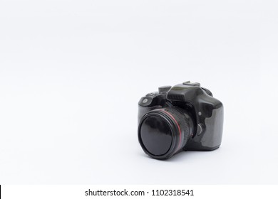 Camera made of plaster on white background