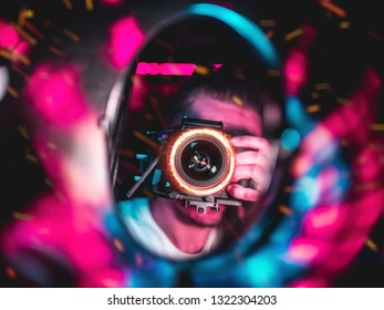 Camera mans in a reflection