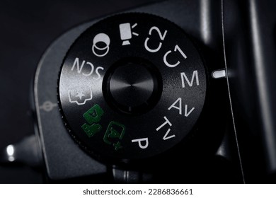 Camera mode dial with manual mode selected. Mode dial on a digital camera