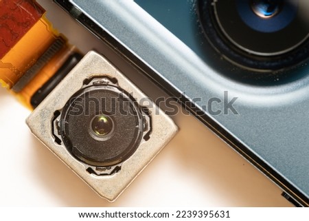 camera modules being used in mobile phones. development of mobile cameras. Digital camera lens part. sensor and technology smartphone new high resolution cameras. Mobile phone camera module