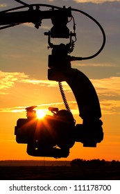 camera on the setting sun