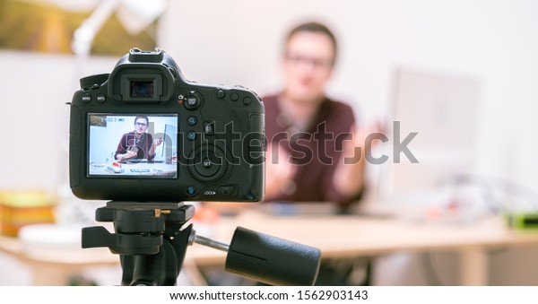 Camera On Tripod Filming Blogger Home Stock Photo (Edit Now) 1562903143