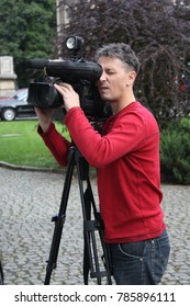 camera operator working with a cinema broadcast TV camera