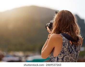 Camera, photographer and woman by mountain on vacation, travel or summer holiday in Switzerland. Dslr picture, photography and person outdoor for adventure, tourism or journey in nature in back view - Powered by Shutterstock