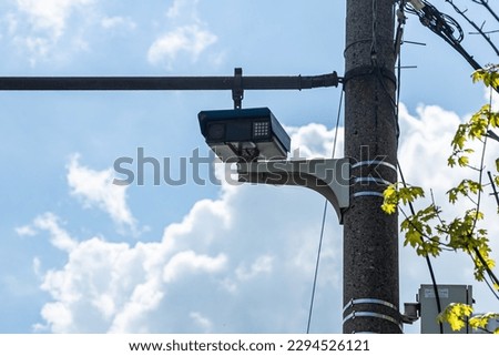 Camera for recording violations of traffic rules. Auto speed camera. Traffic camera. View of the road from the car.