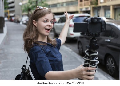 Camera Recording A Young Caucasian Female Blogger Gesturing While Making A Video