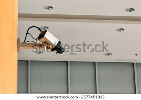 Camera security system have waterproof cover to protect camera installed on wall with home security system concept in building