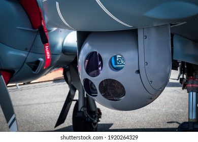 Camera sensor pod under a surveillance aircraft