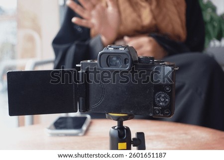 Camera setup for content creation in a cozy indoor space
