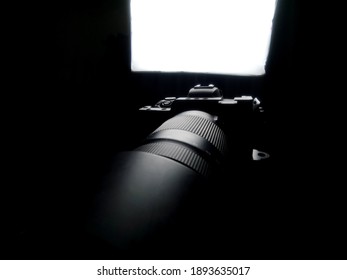 Camera shadow, light coming from behind