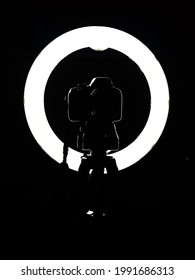 Camera Silhouette By Ring Light