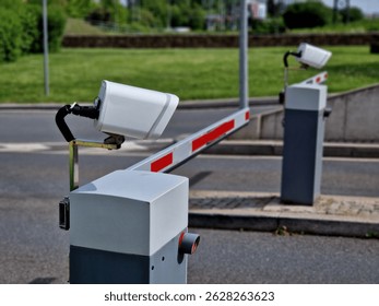 camera system makes it possible to recognize vehicle license plates with high accuracy in real time. The vehicle will arrive at barrier and it will roll up if vehicle number plate has paid fee