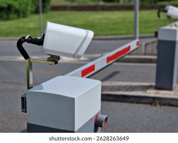 camera system makes it possible to recognize vehicle license plates with high accuracy in real time. The vehicle will arrive at barrier and it will roll up if vehicle number plate has paid fee
