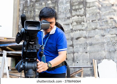 The Cameraman Filming Outdoor Event