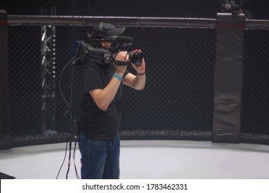 Cameraman On The Set Of The Ultimate Fighting Show. Masked Against Coronavirus