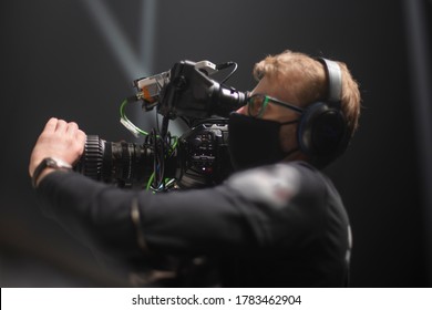 Cameraman On The Set Of The Ultimate Fighting Show. Masked Against Coronavirus