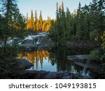 Cameron Falls just outside of Yellowknife, Northwest Territories of Canada in the autumn afternoon.