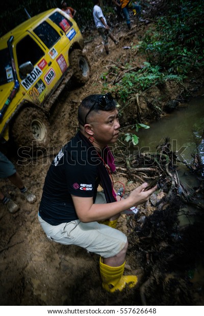 CAMERON HIGHLANDS, MALAYSIA - DECEMBER 05, 2016:\
Rainforest challenge offroad race. Media team trying to capture\
best moments of the\
race
