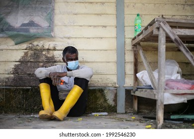 Cameron Highlands,17 June 2021,Malaysia - A  Foreign Worker Working In A Flower Farm In Cameron Highlands,Malaysia.