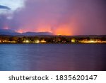 Cameron Peak Fire from Lake Loveland at Sunset.