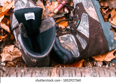 Camo Hunting Boots In The Woods During The Fall.