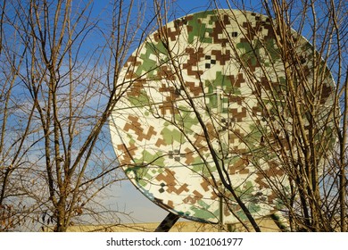 Camoflage Satellite In Trees