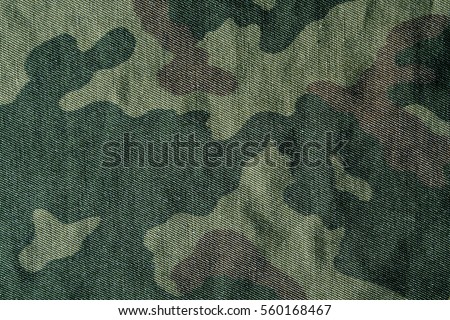 Camouflage pattern cloth texture. Abstract background and texture for design.