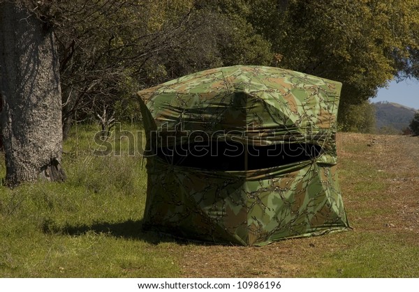 camouflaged\
hunting blind setup ready for the\
hunt