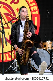 Camp Bestival - 30th July, 2017:  Female Saxophone Player With British Duo Right Said Fred Performing At Camp Bestival, Lulworth, Dorset 30 July 2017, UK