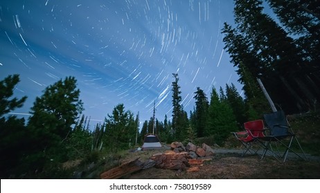 Camp On Mt. Hood With Tent And Chairs Night Sky Star Trails Over Oregon