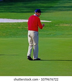 Camp Springs, Maryland, USA,  1992President George H.W. Bush putts out on the 18th green at Andrews Air Force Base golf Course.