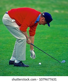 Camp Springs, Maryland, USA,  1992President George H.W. Bush gets ready to chip up onto the 18th green at Andrews Air Force Base golf Course.