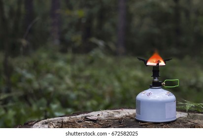 Camp Stove In Night Forest