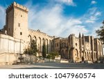 Campane tower and Papal Palace in Avignon, France. Former residence of Pope in 14th century is the largest medieval fortress and gothic palace of Europe and Unesco World Heritage Site